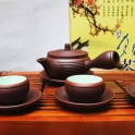 Bộ ấm chén tử sa vuốt tay quai ngang chỉ đỏ